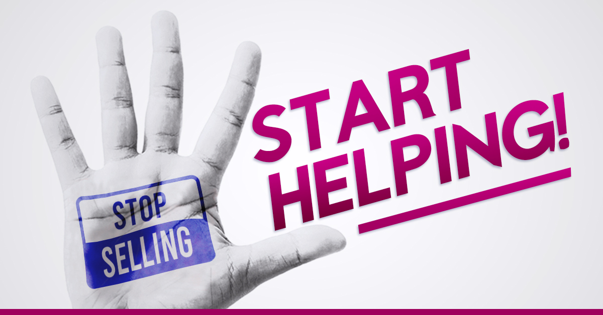 A hand held up saying stop selling and start helping