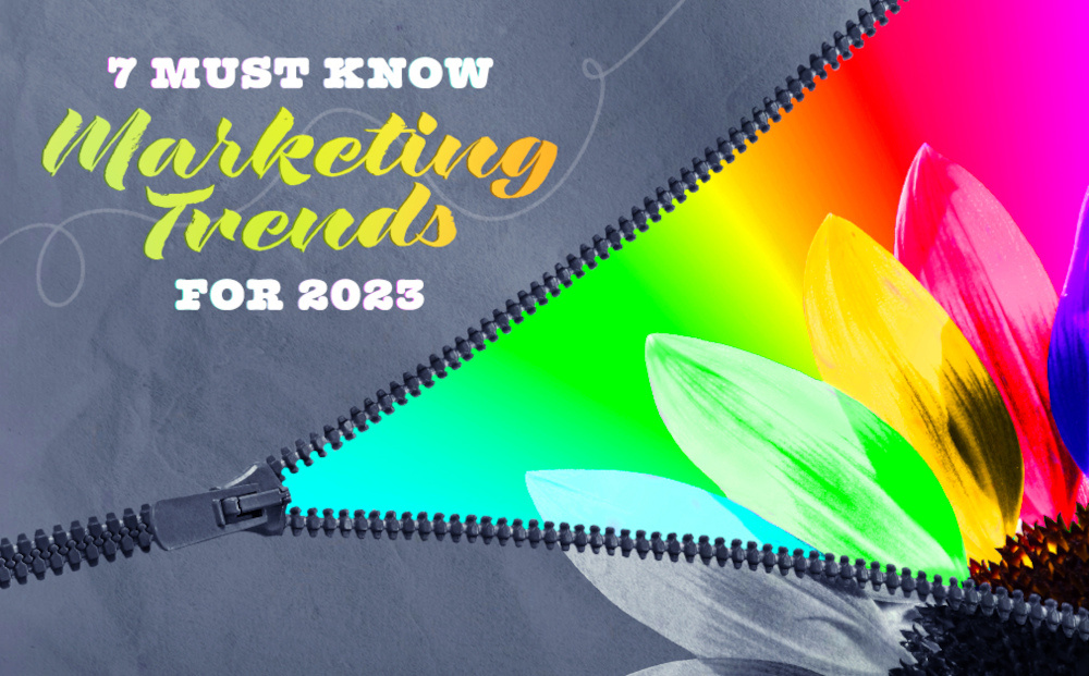 Zipper opening a rainbow of colours and the text 7 must know marketing trends for 2023